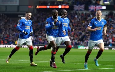 Rangers' Glen Kamara (second left) celebrates scoring their side's second goal of the game with team-mates during the UEFA Europa League semi-final, second leg match at Ibrox Stadium, Glasgow. Picture date: Thursday May 5, 2022.