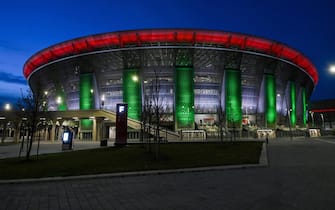 epa10524914 The Puskas Arena is illuminated with the with the colours of the national tricolour during the celebrations to commemorate the 175th anniversary of the outbreak of the 1848 revolution and war of independence against Habsburg rule in Budapest, Hungary, 15 March 2023.  EPA/Tibor Illyes HUNGARY OUT