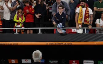 BUDAPEST, HUNGARY - MAY 31: Jose Mourinho Head coach of AS Roma throws his runners' up medal to a young fan in the crowd following the UEFA Europa League 2022/23 final match between Sevilla FC and AS Roma at Puskas Arena on May 31, 2023 in Budapest, Hungary. (Photo by Jonathan Moscrop/Getty Images)