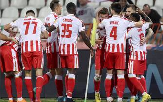 epa10227326 Stefan Mitrovic (4-R) of Red Star celebrates with teammates after scoring the 2-0 lead during the UEFA Europa League group H soccer match between Red Star Belgrade and Ferencvaros Budapest in Belgrade, Serbia, 06 October 2022.  EPA/ANDREJ CUKIC