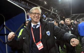 Head coach Markku Kanerva of Finland celebrates after the UEFA Euro 2020 Group J qualification football match between Finland and Liechtenstein in Helsinki, Finland, on November 15, 2019. - Finland has qualified for the first time for a major football tournament. (Photo by Markku Ulander / Lehtikuva / AFP) / Finland OUT (Photo by MARKKU ULANDER/Lehtikuva/AFP via Getty Images)