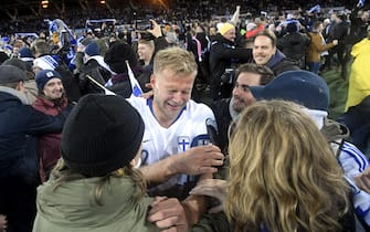 Paulus Arajuuri of Finland celebrates with fans after the UEFA Euro 2020 Group J qualification football match between Finland and Liechtenstein in Helsinki, Finland, on November 15, 2019. - Finland has qualified for the first time for a major football tournament. (Photo by Markku Ulander / Lehtikuva / AFP) / Finland OUT (Photo by MARKKU ULANDER/Lehtikuva/AFP via Getty Images)