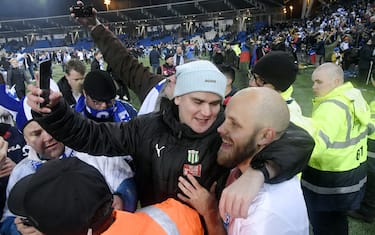 Teemu Pukki of Finland celebrates with fans after the UEFA Euro 2020 Group J qualification football match between Finland and Liechtenstein in Helsinki, Finland, on November 15, 2019. - Finland has qualified for the first time for a major football tournament. (Photo by Markku Ulander / Lehtikuva / AFP) / Finland OUT (Photo by MARKKU ULANDER/Lehtikuva/AFP via Getty Images)