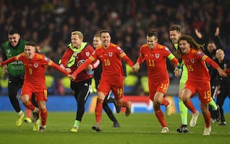 CARDIFF, WALES - NOVEMBER 19: Harry Wilson of Wales , Aaron Ramsey of Wales and Gareth Bale of Wales celebrate after the UEFA Euro 2020 qualifier between Wales and Hungary so at Cardiff City Stadium on November 19, 2019 in Cardiff, Wales. (Photo by Harry Trump/Getty Images)