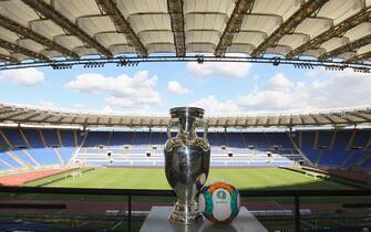 609737312 ROME, ITALY - SEPTEMBER 22: A general view of UEFA Euro Trophy in the Stadio Olimpico during the UEFA Euro Roma 2020 Official Logo unveiling at Palazzo delle Armi on September 22, 2016 in Rome, Italy. (Photo by Paolo Bruno/Getty Images)