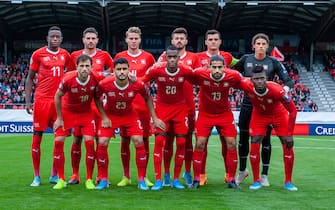 SION, SWITZERLAND - SEPTEMBER 08: Team Switzerland poses for team photo. From top left: #17 Denis Zakaria, #23 Loris Benito, #11 Renato Steffen, #15 Albian Ajeti, #10 Granit Xhaka and #1 Yann Sommer. From bottom left #18 Admir Mehmedi, #23 Loris Benito, #20 Edimilson Fernandes, #13 Ricardo Rodriguez and #7 Breel Embolo  during the UEFA Euro 2020 qualifier match between Switzerland and Gibraltar on September 8, 2019 at Stade de Tourbillon in Sion, Switzerland. (Photo by RvS.Media/Robert Hradil/Getty Images)