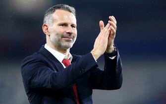 1188734291 CARDIFF, WALES - NOVEMBER 19: Wales Manager Ryan Giggs celebrates after winning the UEFA Euro 2020 qualifier between Wales and Hungary so at Cardiff City Stadium on November 19, 2019 in Cardiff, Wales. (Photo by Chloe Knott - Danehouse/Getty Images)