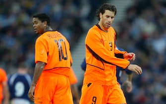 GLASGOW, SCOTLAND - NOVEMBER 15:  Patrick Kluivert and Ruud van Nistelrooy of Holland during the Euro 2004 Play-off, first leg match between Scotland and Holland at Hampden Park on November 15, 2003 in Glasgow, Scotland. (Photo by Ross Kinnaird/Getty Images)