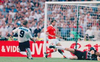 LONDON, UNITED KINGDOM - JUNE 18:  England player Alan Shearer (l) scores the third goal during the European Championship Finals group match between England and Holland at Wembley, on June 18, 1996 in London, England. England won the match 4-1.  (Photo by Stu Forster/Getty Images)