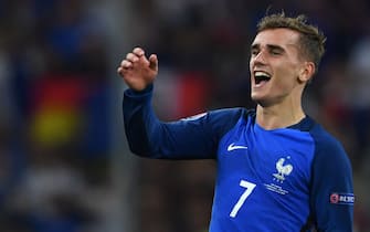 France's forward Antoine Griezmann celebrates after winning the Euro 2016 semi-final football match between Germany and France at the Stade Velodrome in Marseille on July 7, 2016.
 / AFP / BERTRAND LANGLOIS        (Photo credit should read BERTRAND LANGLOIS/AFP via Getty Images)