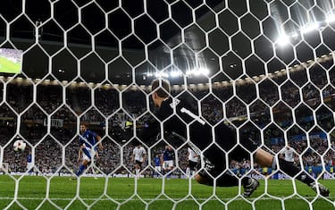 BORDEAUX, FRANCE - JULY 02:  Manuel Neuer of Germany dives in vain as Leonardo Bonucci of Italy converts the penalty to score his team's first goal during the UEFA EURO 2016 quarter final match between Germany and Italy at Stade Matmut Atlantique on July 2, 2016 in Bordeaux, France.  (Photo by Laurence Griffiths/Getty Images)
