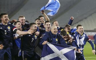 epa08816819 Scotland's players celebrate after winning the penalty shootout of the UEFA EURO 2020 qualification playoff match between Serbia and Scotland in Belgrade, Serbia, 12 November 2020.  EPA/ANDREJ CUKIC