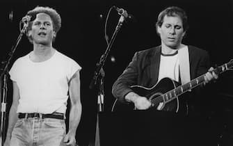 circa 1967:  Folk pop duo Art Garfunkel and Paul Simon, playing in front of more than 50,000 people in Madrid, at the start of their European tour.  (Photo by Central Press/Getty Images)