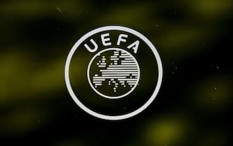 epa09792223 (FILE) - A UEFA logo is pictured through a window prior to the UEFA Europa League 2019/20 Round of 16 draw, at the UEFA Headquarters in Nyon, Switzerland, 28 February 2020 (re-issued on 28 February 2022). The world's football governing body FIFA together with the governing body of European football UEFA announced on 28 February 2022 to have decided together 'that all Russian teams, whether national representative teams or club teams, shall be suspended from participation in both FIFA and UEFA competitions until further notice'.  EPA/JEAN-CHRISTOPHE BOTT *** Local Caption *** 55912791