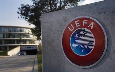 epa08300459 (FILE) - The UEFA logo on display next to the entrance of the UEFA Headquarters in Nyon, Switzerland, 06 April 2016 (re-issued on 17 March 2020). The UEFA EURO 2020 has been postponed to 2021 amid the coronavirus COVID-19 pandemic, the Norwegian Football Association (NFF) announced on 17 March 2020.  EPA/JEAN-CHRISTOPHE BOTT *** Local Caption *** 52687192