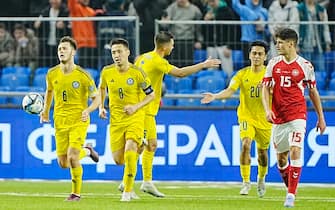 epa10544198 Players from Kazakhstan celebrate after scoring during the UEFA Euro 2024 qualification soccer match between Kazakhstan and Denmark at Astana Arena in Astana, Kazakhstan, 26 March 2023.  EPA/Bo Amstrup  DENMARK OUT