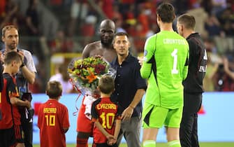 epa10697328 Belgian player Eden Hazard (C) and his children attend a farewell ceremony for Hazard who scored 33 times for the national team after the UEFA EURO 2024 qualifying match between Belgium and Austria, in Brussels, Belgium, 17 June 2023.  EPA/OLIVIER MATTHYS