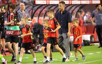 epa10697327 Belgian player Eden Hazard and his children leave the stadium after the farewell ceremony for Hazard who scored 33 times for the national team after the UEFA EURO 2024 qualifying match between Belgium and Austria, in Brussels, Belgium, 17 June 2023.  EPA/OLIVIER MATTHYS