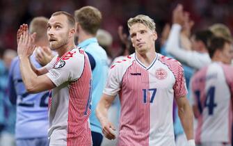 epa10695971 Danish players Christian Eriksen (R) and Jens Stryger reacts after winning the UEFA Euro 2024 group H qualification soccer match between Denmark and Northern Ireland in Copenhagen, Denmark, 16 June 2023.  EPA/Liselotte Sabroe  DENMARK OUT