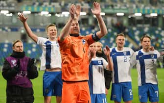 epa10544724 Finland players celebrate after the UEFA EURO 2024 qualification match between Northern Ireland and Finland in Belfast, Britain, 26 March 2023.  EPA/MARK MARLOW