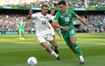 Republic of Ireland's Jamie McGrath (right) and Gibraltar's Roy Chipolina battle for the ball during the UEFA Euro 2024 Qualifying Group B match at the Aviva Stadium, Dublin. Picture date: Monday June 19, 2023.