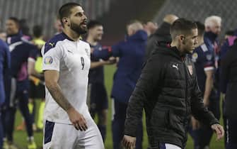 epa08816873 Serbia's Aleksandar Mitrovic (L) leaves the pitch after the UEFA EURO 2020 qualification playoff match between Serbia and Scotland in Belgrade, Serbia, 12 November 2020.  EPA/ANDREJ CUKIC