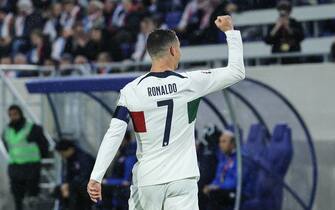 epa10544599 Portugal`s Cristiano Ronaldo celebrates after scoring the 0-1 goal during the UEFA EURO 2024 Group J qualifying soccer match between Luxembourg and Portugal, in Luxembourg, 26 March 2023.  EPA/MIGUEL A. LOPES