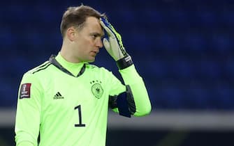 epa09097615 Germany's goalkeeper Manuel Neuer reacts during the FIFA World Cup 2022 qualifying soccer match between Germany and Iceland in Duisburg, Germany, 25 March 2021.  EPA/Friedemann Vogel