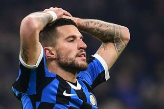 Inter Milan's Italian defender Cristiano Biraghi reacts after missing a goal opportunity during the Italian Serie A football match Inter Milan vs AS Rome on December 6, 2019 at the San Siro stadium in Milan. (Photo by Miguel MEDINA / AFP) (Photo by MIGUEL MEDINA/AFP via Getty Images)