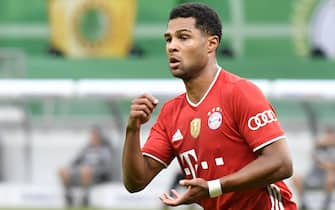 epa08527436 Bayern Munich's Serge Gnabry celebrates after scoring the 2-0 lead during the German DFB Cup final between Bayer 04 Leverkusen and FC Bayern Munich at Olympic Stadium in Berlin, Germany, 04 July 2020.  EPA/JOHN MACDOUGALL / POOL CONDITIONS - ATTENTION: The DFB regulations prohibit any use of photographs as image sequences and/or quasi-video.