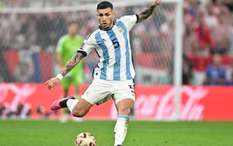 epa10364218 Leandro Paredes of Argentina in action during the FIFA World Cup 2022 semi final between Argentina and Croatia at Lusail Stadium in Lusail, Qatar, 13 December 2022.  EPA/Noushad Thekkayil