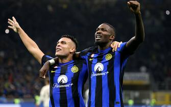 Inter Milan’s Marcus Thuram (R)  jubilates with his teammate Lautaro Martinez after scoring goal of 1 to 0 during the Italian serie A soccer match between Fc Inter  and Roma Giuseppe Meazza stadium in Milan, 29 October 2023.ANSA / MATTEO BAZZI