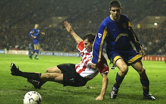 SUNDERLAND - DECEMBER 26:  James Milner of Leeds clashes with Kevin Kilbane of Sunderland during the FA Barclaycard Premiership match between Sunderland and Leeds United at the Stadium of Light on December 26, 2002 in Sunderland, England. (Photo by Gary M. Prior/Getty Images) 