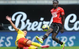 Rennes' French midfielder Lesley Ugochukwu (R) fights for the ball with Lens' French forward Florian Sotoca (L) during the French L1 football match between Stade Rennais (Rennes) and RC Lens at The Roazhon Park Stadium in Rennes, northern France on August 8, 2021. (Photo by JEAN-FRANCOIS MONIER / AFP) (Photo by JEAN-FRANCOIS MONIER/AFP via Getty Images)