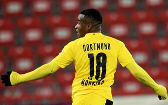 GERMANY SOCCER BUNDESLIGA epa08892701 Dortmund's Youssoufa Moukoko celebrates scoring the equalizer during the German Bundesliga soccer match between 1. FC Union Berlin and Borussia Dortmund in Berlin, Germany, 18 December 2020. EPA/ANNEGRET HILSE / POOL CONDITIONS - ATTENTION: The DFL regulations prohibit any use of photographs as image sequences and/or quasi-video.