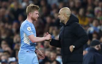 Manchester, England, 20th April 2022.   Josep Guardiola manager of Manchester City substitutes Kevin De Bruyne of Manchester City during the Premier League match at the Etihad Stadium, Manchester. Picture credit should read: Darren Staples / Sportimage via PA Images