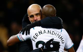 Manchester City Manager Pep Guardiola and Fernandinho of Manchester City at the end of the Premier League match at Carrow Road, Norwich
Picture by Paul Chesterton/Focus Images/Sipa USA 
12/02/2022