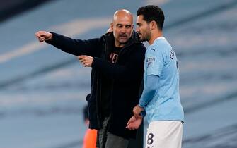 Josep Guardiola manager of Manchester City brings on Ilkay Gundogan of Manchester City during the Premier League match at the Etihad Stadium, Manchester. Picture date: 17th October 2020. Picture credit should read: Andrew Yates/Sportimage via PA Images