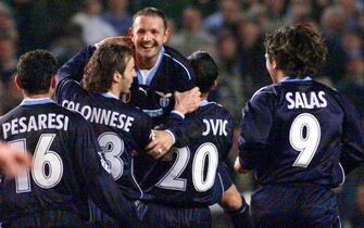 LEE06 - 20010314 - LEEDS, UNITED KINGDOM : Lazio's Sinisa Mihajlovic is held in the air by teammates after scoring Lazio's late equalizer to make the score 3-3, 14 March 2001, against Leeds United during their UEFA group D Champions League match at Elland Road, Leeds.  
EPA PHOTO EPA/GERRY PENNY/gp/cha