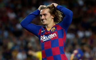 BARCELONA, SPAIN - AUGUST 04: Antoine Griezmann of FC Barcelona smiles during the match between FC Barcelona and Arsenal at Nou Camp on August 04, 2019 in Barcelona, Spain. (Photo by TF-Images/Getty Images)