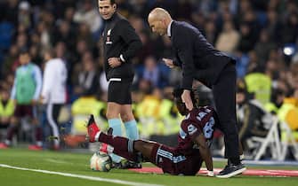MADRID, SPAIN - FEBRUARY 16: Zinedine Zidane, Manager of Real Madrid CF is hitted by Aidoo of RC Celta de Vigo during the Liga match between Real Madrid CF and RC Celta de Vigo at Estadio Santiago Bernabeu on February 16, 2020 in Madrid, Spain. (Photo by Diego Souto/Quality Sport Images/Getty Images)
