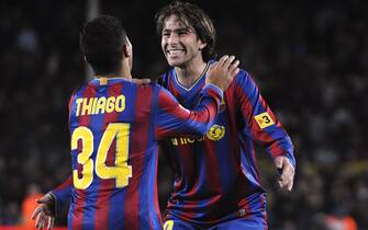 BARCELONA, SPAIN - FEBRUARY 20:  Thiago of Barcelona celebrates with  Maxwell Scherrer after scoring his team's fourth goal during the La Liga match between Barcelona and Racing Santander at Camp Nou stadium on February 20, 2010 in Barcelona, Spain.  (Photo by Denis Doyle/Getty Images)