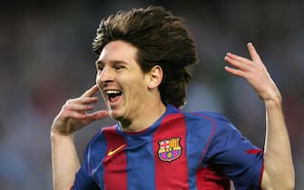 BARCELONA, SPAIN:  FC Barcelona's Argentinian Messi celebrates his goal against Albacete during their Spanish League football match at the Camp Nou stadium in Barcelona, 01 May 2005. FC Barcelona won 2-0. AFP PHOTO/LLUIS GENE.  (Photo credit should read LLUIS GENE/AFP/Getty Images)
