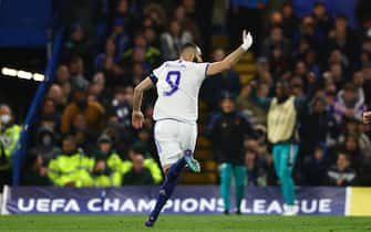 London, England, 6th April 2022.   Karim Benzema of Real Madrid celebrates scoring his third goal of the match during the UEFA Champions League match at Stamford Bridge, London. Picture credit should read: David Klein / Sportimage via PA Images