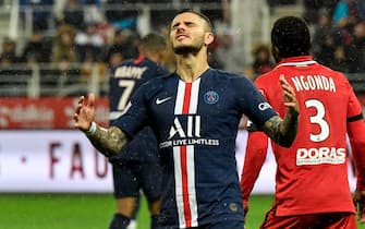 Paris Saint-Germain's Argentine forward Mauro Icardi reacts after missing an opportunity to score during the French L1 football match between Dijon Football Cote-d'Or (DFCO) and Paris Saint-Germain (PSG) on November 1, 2019, at the Gaston Gerard stadium in Dijon. (Photo by Philippe DESMAZES / AFP) (Photo by PHILIPPE DESMAZES/AFP via Getty Images)