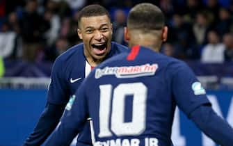 LYON, FRANCE - MARCH 4: Kylian Mbappe of PSG celebrates his third goal with Neymar Jr during the French Cup semifinal match between Olympique Lyonnais (OL) and Paris Saint-Germain (PSG) at Groupama Stadium on March 4, 2020 in Decines near Lyon, France. (Photo by Jean Catuffe/Getty Images)
