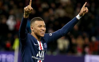 PARIS, FRANCE - FEBRUARY 29: Kylian Mbappe of PSG celebrates his second goal during the Ligue 1 match between Paris Saint-Germain (PSG) and Dijon FCO at Parc des Princes stadium on February 29, 2020 in Paris, France. (Photo by Jean Catuffe/Getty Images)