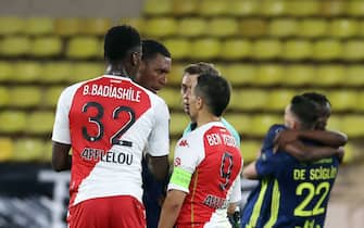 Players argue a the end of the L1 football match between Monaco (ASM) and Lyon (OL) at The Louis II Stadium, in Monaco on May 2, 2021. (Photo by Valery HACHE / AFP) (Photo by VALERY HACHE/AFP via Getty Images)