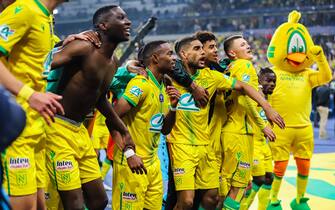 Players and Fans of FC Nantes celebrates the winning trophy following the French Cup Final between OGC Nice (OGCN) and FC Nantes (FCN) at Stade de France on May 7, 2022 in Saint-Denis near Paris, France.