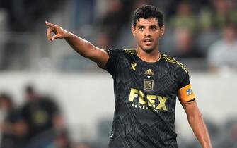 epa10865613 Los Angeles FC forward Carlos Vela reacts after a referee call during the second half of the Major League Soccer (MLS) match between Galaxy and LAFC at BMO Stadium in Los Angeles, California, USA, 16 September 2023.  EPA/ALLISON DINNER